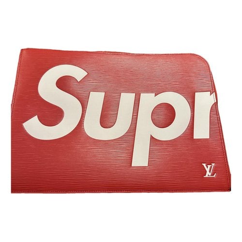 Pre-owned Louis Vuitton X Supreme Leather Travel Bag In Red