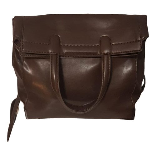 Pre-owned Bocage Leather Clutch Bag In Brown
