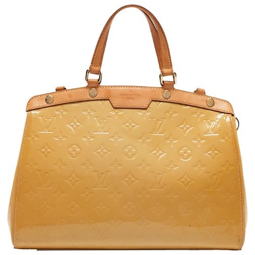 Pre-owned Louis Vuitton Patent Leather Satchel In Yellow