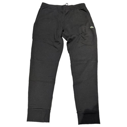 Pre-owned Lacoste Trousers In Black