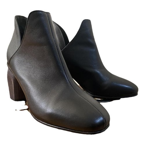 Pre-owned Initial Leather Boots In Black