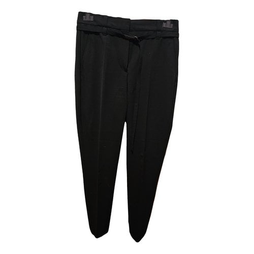 Pre-owned Brunello Cucinelli Wool Trousers In Black