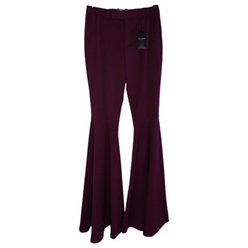 Pre-owned Saint Laurent Wool Trousers In Purple