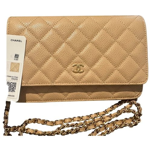 Pre-owned Chanel Wallet On Chain Timeless/classique Leather Crossbody Bag In Beige