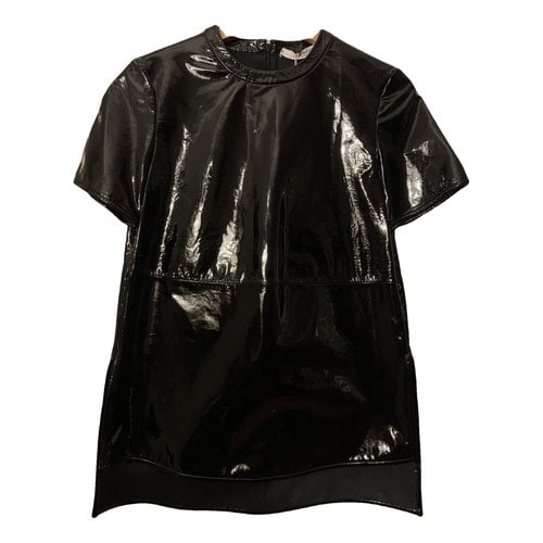 Pre-owned Givenchy Patent Leather T-shirt In Black