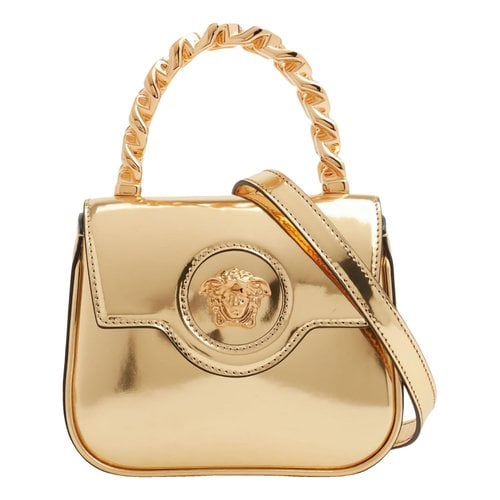 Pre-owned Versace La Medusa Leather Handbag In Gold