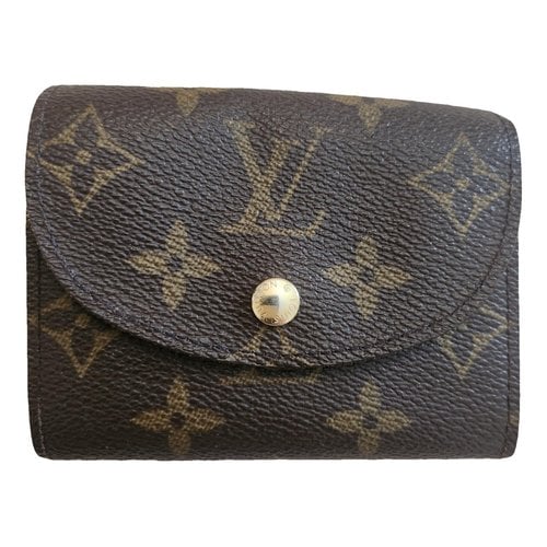 Pre-owned Louis Vuitton Marly Dragonne Leather Clutch Bag In Brown
