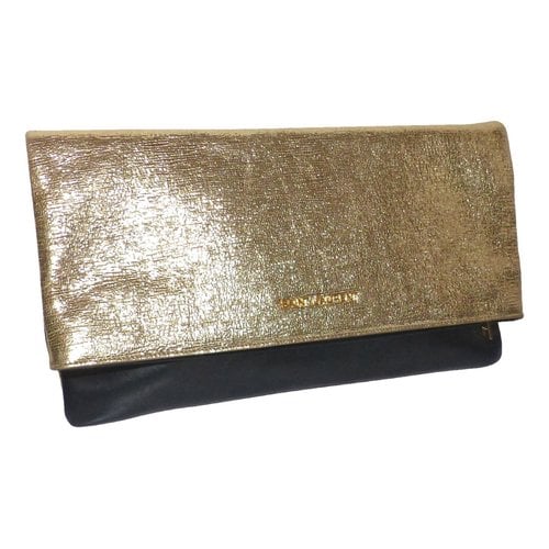 Pre-owned Saint Laurent Leather Clutch Bag In Gold