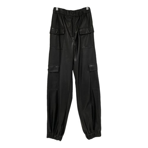 Pre-owned Msgm Vegan Leather Trousers In Black