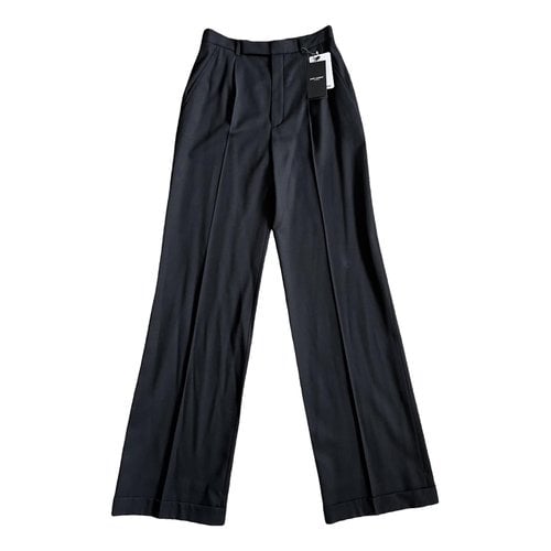 Pre-owned Saint Laurent Wool Large Pants In Black
