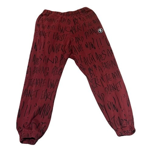 Pre-owned A Bathing Ape Trousers In Red