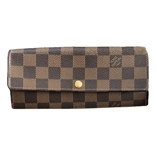 Pre-owned Louis Vuitton Sarah Leather Wallet In Brown