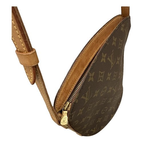 Pre-owned Louis Vuitton Bagatelle Leather Clutch Bag In Brown