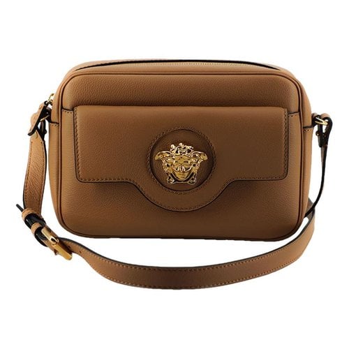 Pre-owned Versace La Medusa Leather Crossbody Bag In Brown
