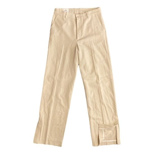 Pre-owned Axel Arigato Trousers In Ecru