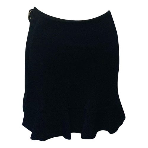 Pre-owned Moschino Wool Mid-length Skirt In Black