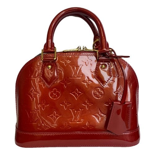 Pre-owned Louis Vuitton Alma Bb Patent Leather Handbag In Red