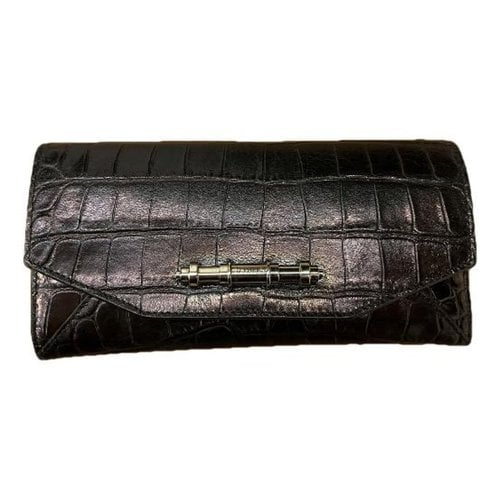 Pre-owned Givenchy Leather Wallet In Black