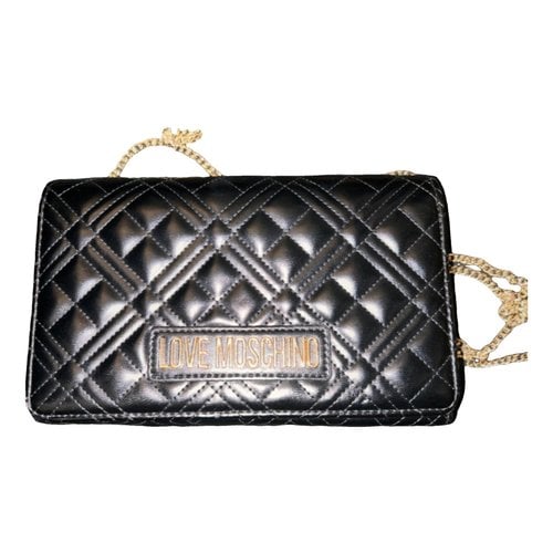 Pre-owned Moschino Love Leather Clutch Bag In Black