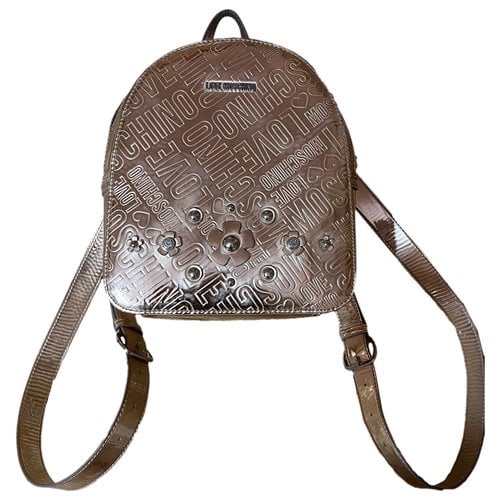 Pre-owned Moschino Love Leather Backpack In Gold