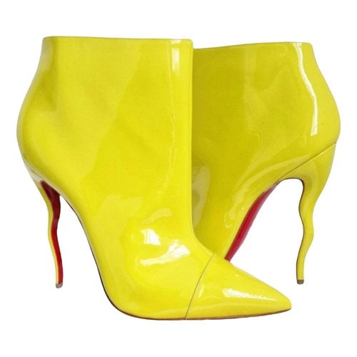 Pre-owned Christian Louboutin Patent Leather Ankle Boots In Yellow