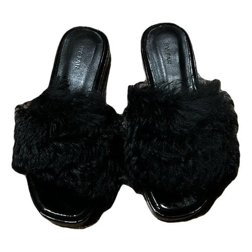 Pre-owned By Far Faux Fur Mules In Black