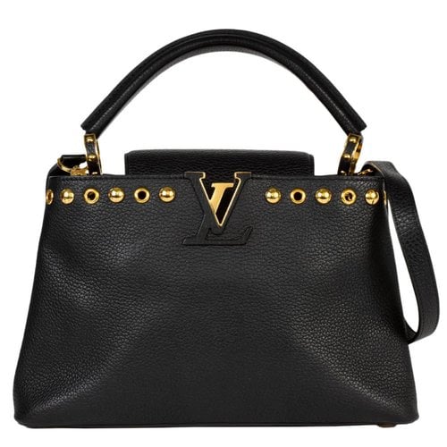 Pre-owned Louis Vuitton Capucines Leather Handbag In Black