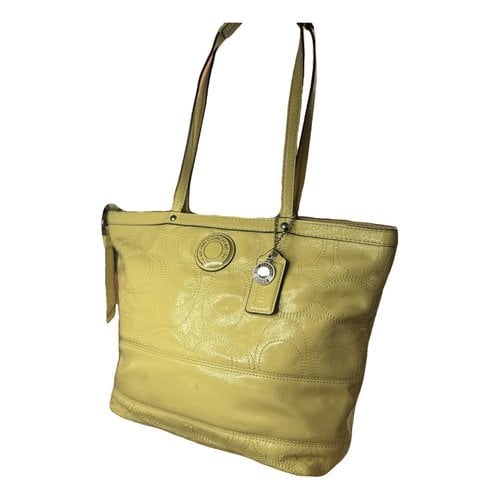 Pre-owned Coach City Zip Tote Leather Handbag In Yellow