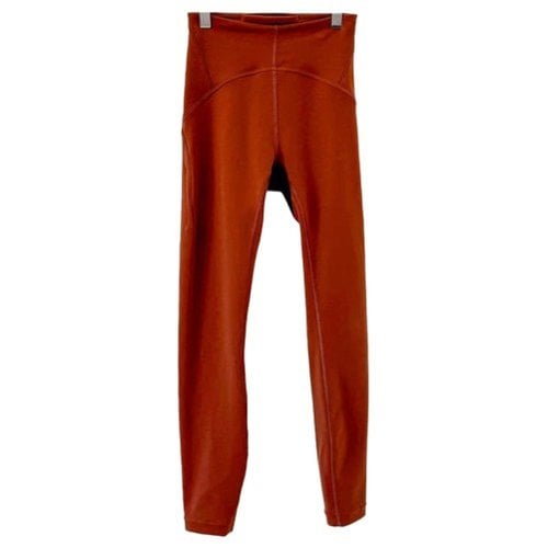 Pre-owned Lululemon Trousers In Orange