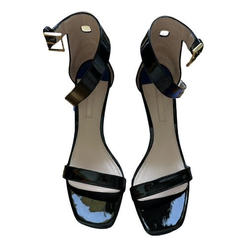 Pre-owned Stuart Weitzman Patent Leather Sandal In Black