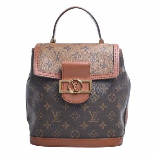 Pre-owned Louis Vuitton Dauphine Cloth Backpack In Brown