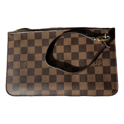 Pre-owned Louis Vuitton Neverfull Leather Clutch Bag In Brown