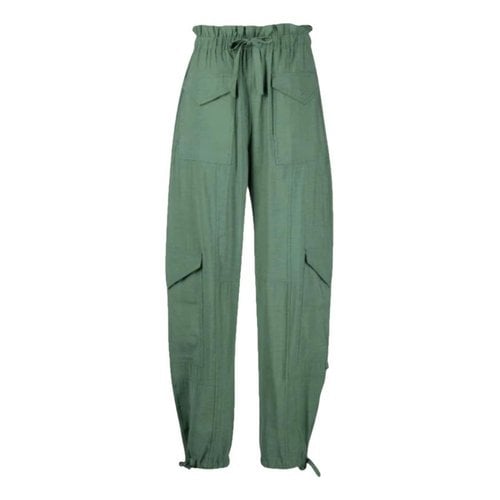 Pre-owned Ganni Cloth Trousers In Green