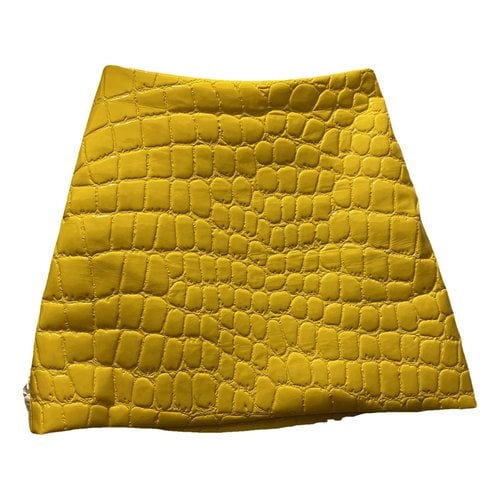 Pre-owned Miu Miu Vinyl Mini Skirt In Yellow