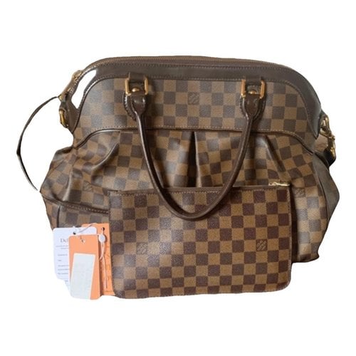 Pre-owned Louis Vuitton Trevi Cloth Handbag In Brown
