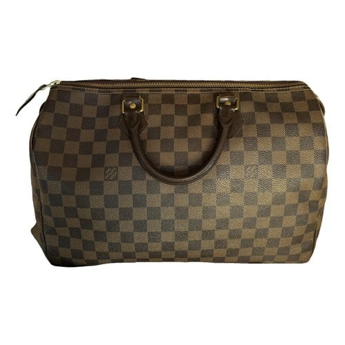 Pre-owned Louis Vuitton Speedy Bandoulière Leather Handbag In Brown