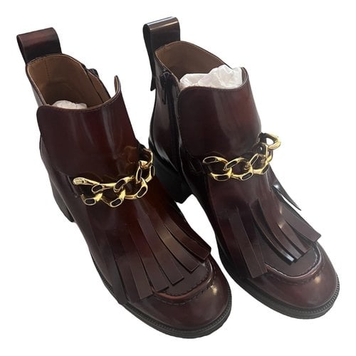 Pre-owned See By Chloé Leather Buckled Boots In Burgundy