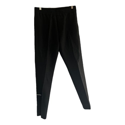 Pre-owned Acne Studios Trousers In Black