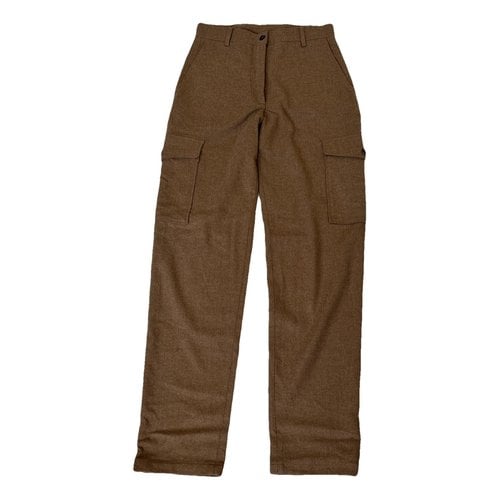 Pre-owned Diega Wool Trousers In Brown