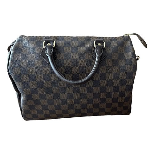 Pre-owned Louis Vuitton Speedy Patent Leather Handbag In Brown