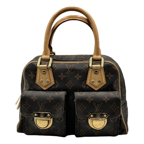 Pre-owned Louis Vuitton Manhattan Cloth Handbag In Brown