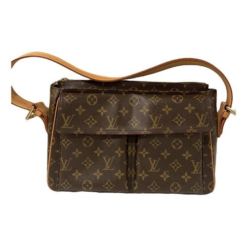 Pre-owned Louis Vuitton Viva Cité Leather Handbag In Brown