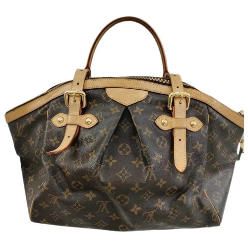 Pre-owned Louis Vuitton Tivoli Cloth Handbag In Other
