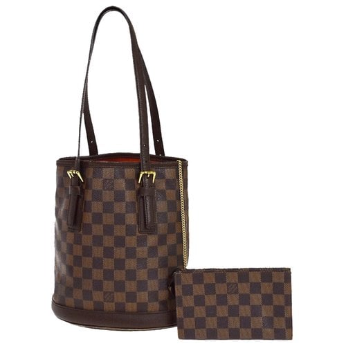 Pre-owned Louis Vuitton Bucket Cloth Handbag In Brown