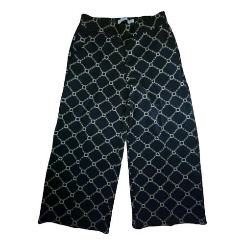Pre-owned Ichi Trousers In Black