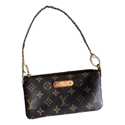 Pre-owned Louis Vuitton Milla Leather Handbag In Brown
