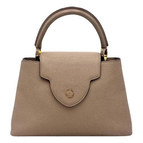Pre-owned Louis Vuitton Capucines Leather Handbag In Beige