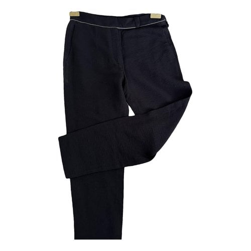 Pre-owned Sandro Trousers In Black