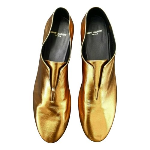 Pre-owned Saint Laurent Leather Flats In Gold