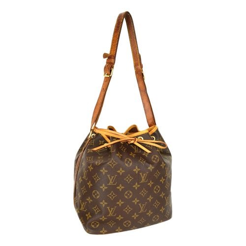 Pre-owned Louis Vuitton Noé Leather Handbag In Brown